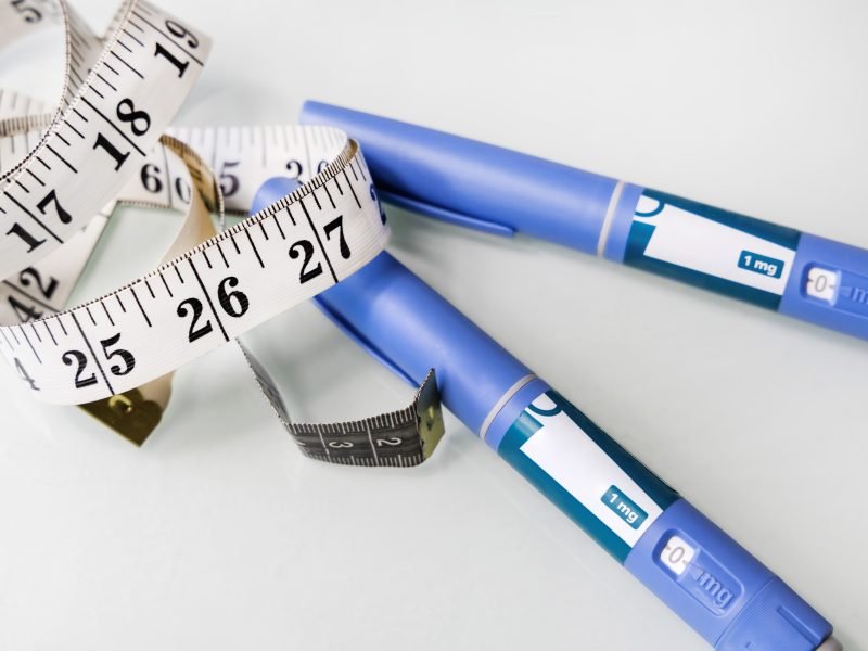 Ozempic Insulin injection pen for diabetics. Concept of losing weight with the drug.